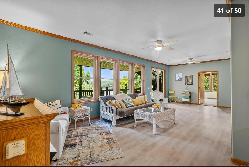 Downstairs living room with coastal decor and natural light